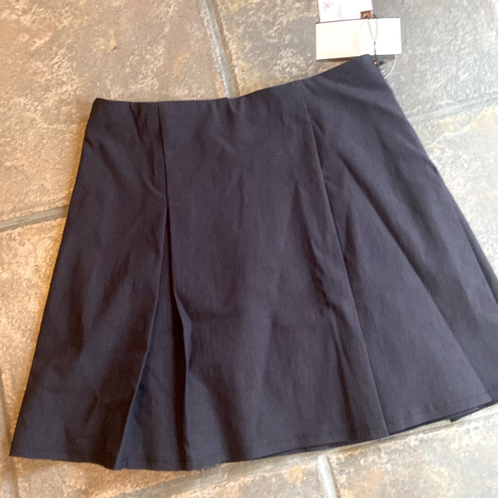 Girls pleated navy blue skirt